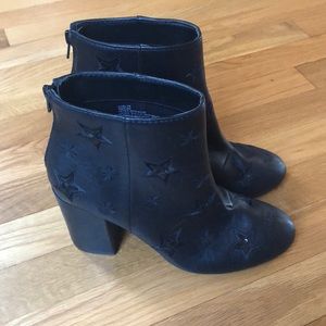 Star print ankle boots